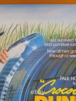 CROCODILE DUNDEE (1986) rare ROLLED original UK quad poster Daniel Gouzee art