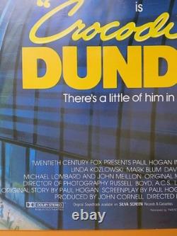 CROCODILE DUNDEE (1986) rare ROLLED original UK quad poster Daniel Gouzee art