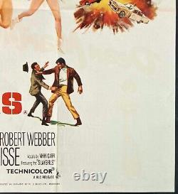 L'affiche originale du cinéma du film 'The Silencers' avec Dean Martin dans le rôle de Matt Helm en 1966.